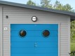Blå garageport från Diplomat dörrar